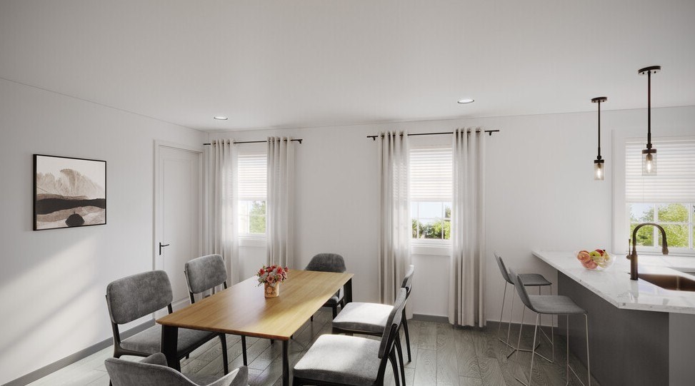 A modern dining room with a wooden table and grey chairs.
