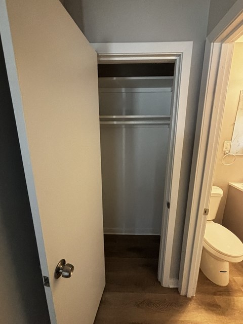a small closet in the hallway