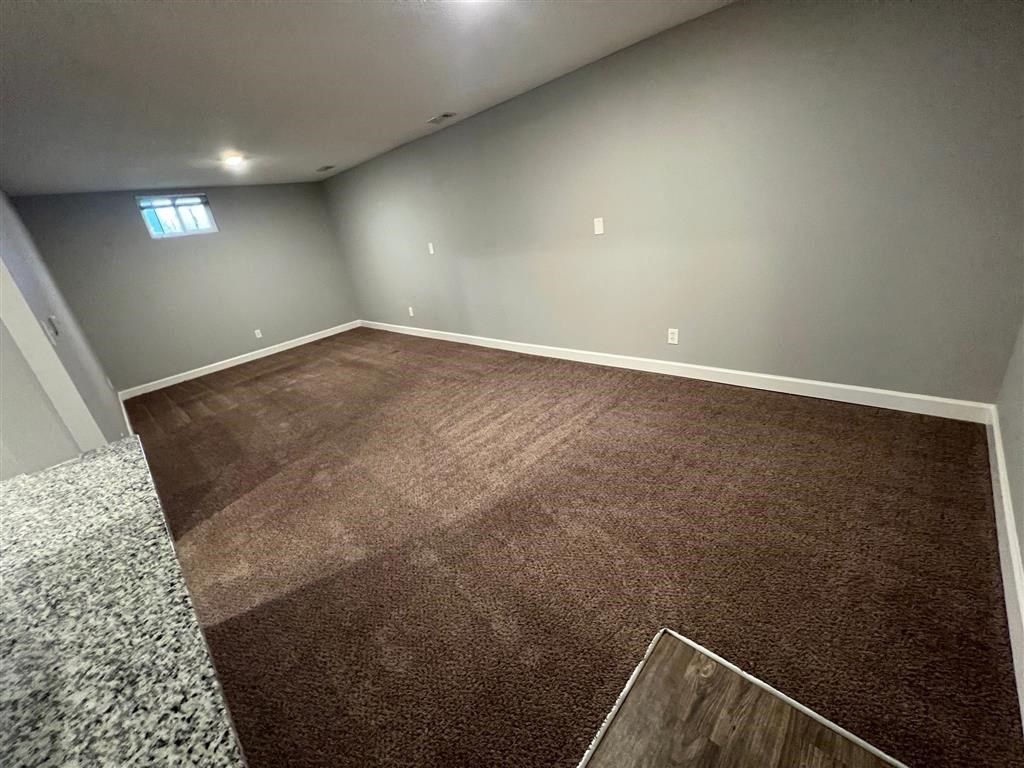 a bedroom with a window