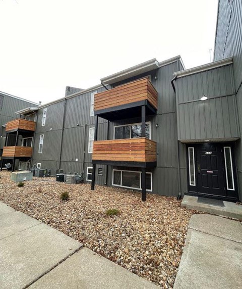 a set of stairs with a building in the background
