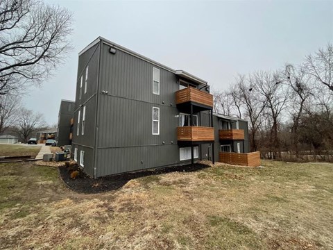 an apartment building with balconiesd