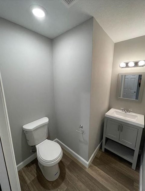 a small bathroom with a toilet and a sink