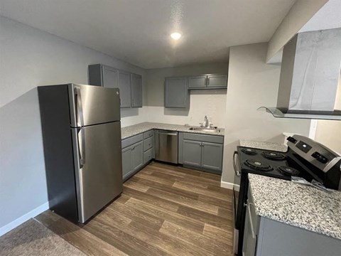 a kitchen with stainless steel appliances