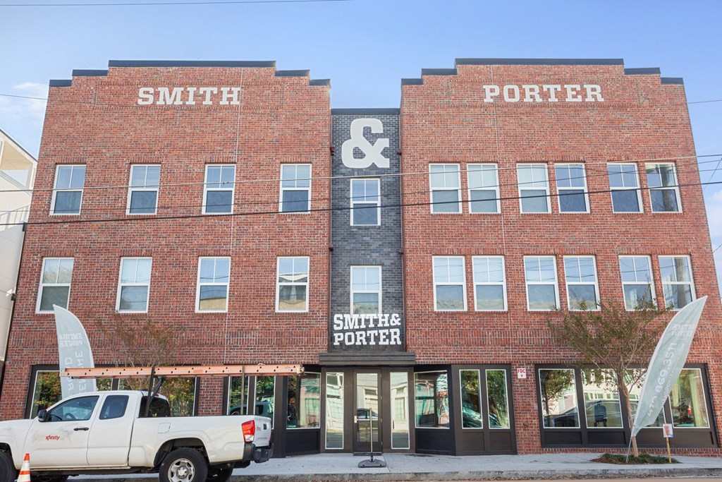 A red brick building with the words Smith Porter on it.