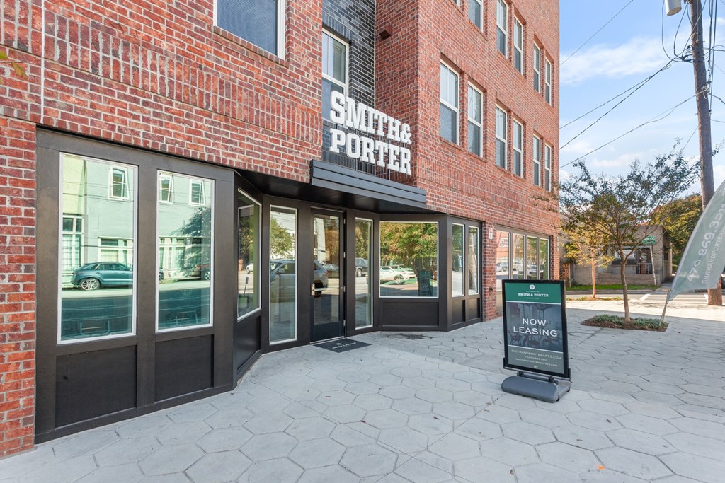 The front of a building with a sign that says