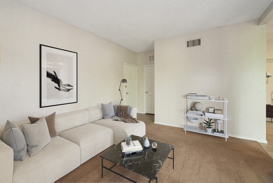a living room with a couch and a coffee table