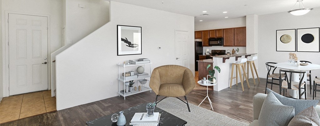 a living room with a dining room and a kitchen