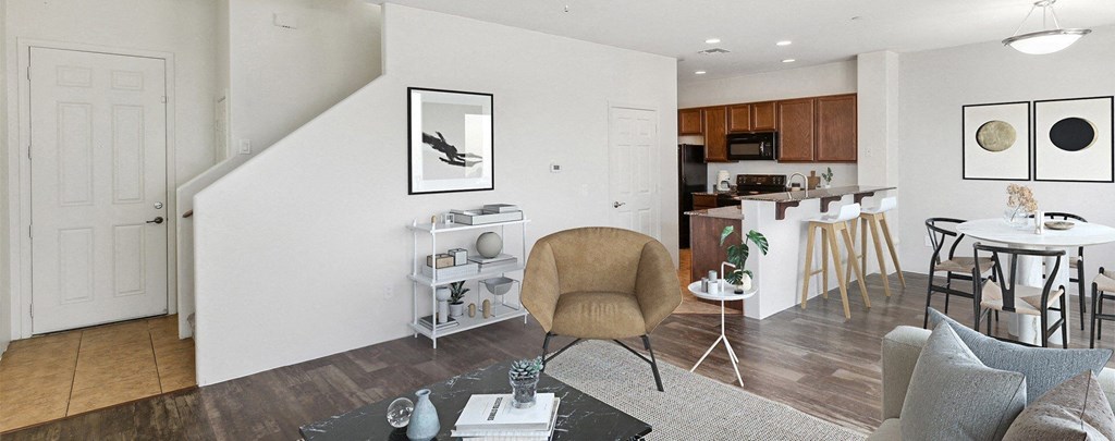 a living room with a dining room and a kitchen