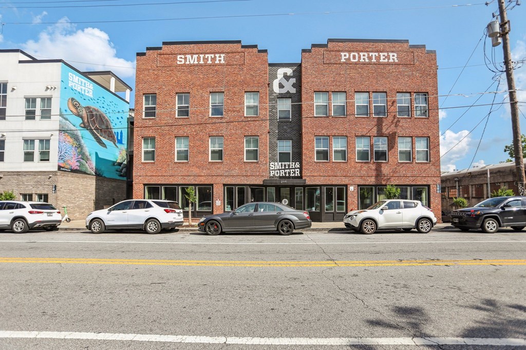 A street view of a building with the sign