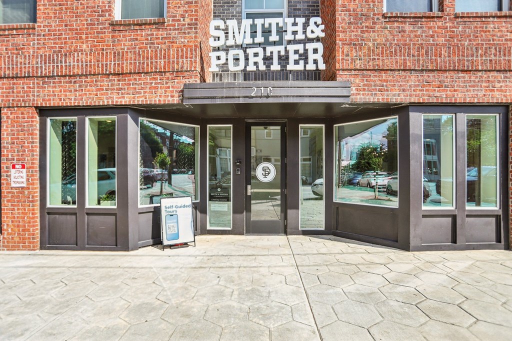 The front of a brick building with the name