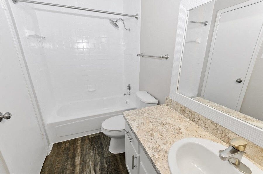 a bathroom with a sink toilet and a shower at Heatherstone, Dallas, TX