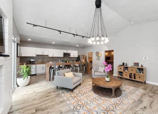a living room with a kitchen and a dining room at Heatherstone, Texas, 75287
