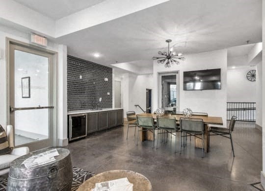 a living room and dining room with a table and chairs at Smith and Porter, Atlanta