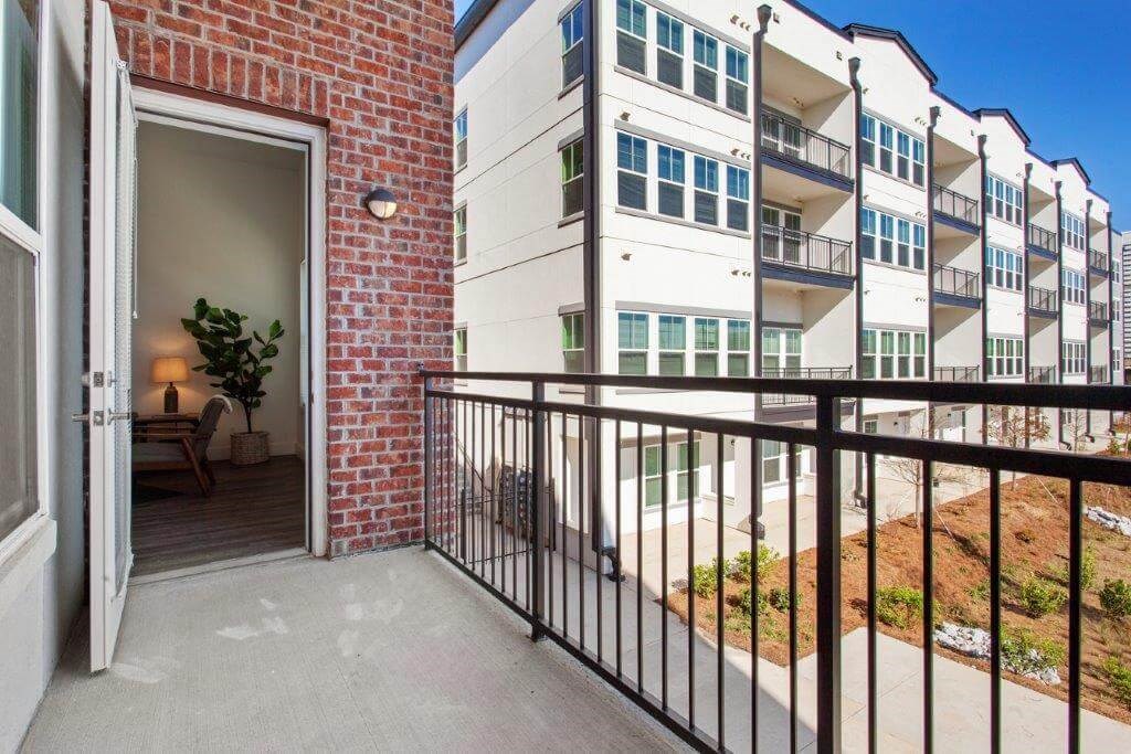 the view from the balcony of an apartment building with the door open at Smith and Porter, Atlanta, GA, 30313