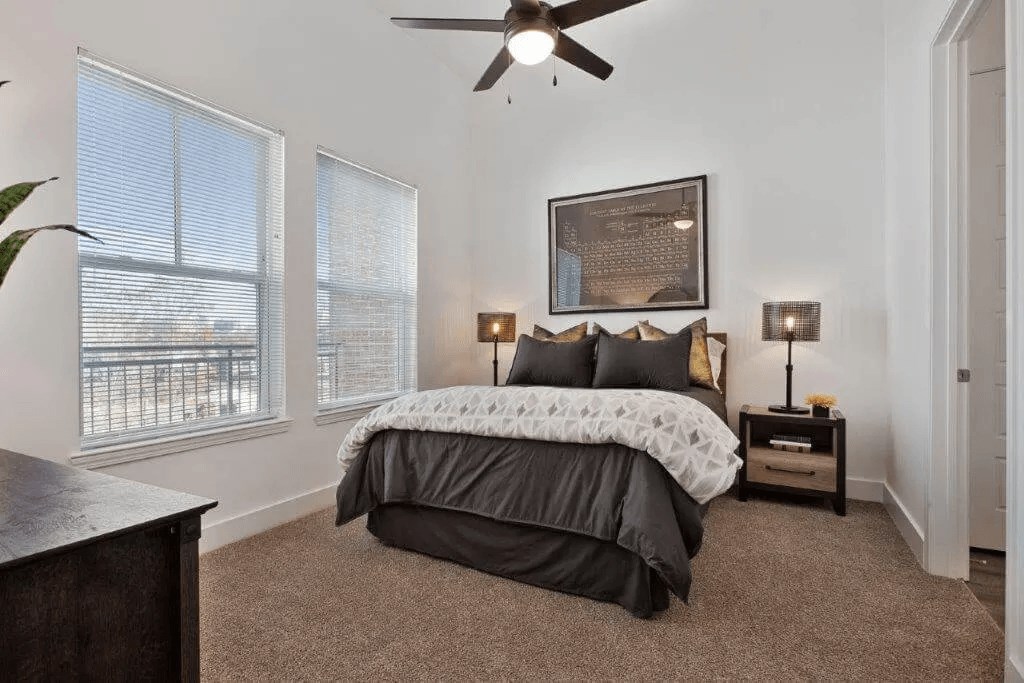 a bedroom with a bed and a ceiling fan at Smith and Porter, Atlanta, 30313