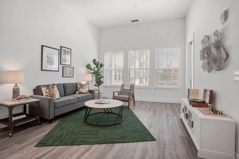 a living room with a couch and a table