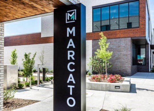 the front of a building with a sign that readsat Marcato, Kansas City, Missouri
