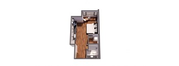 A top down view of a small apartment with a bedroom and a living room.