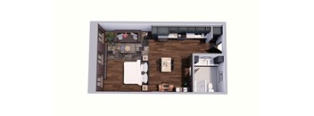 A top-down view of a living room with a couch, coffee table, and kitchen area.