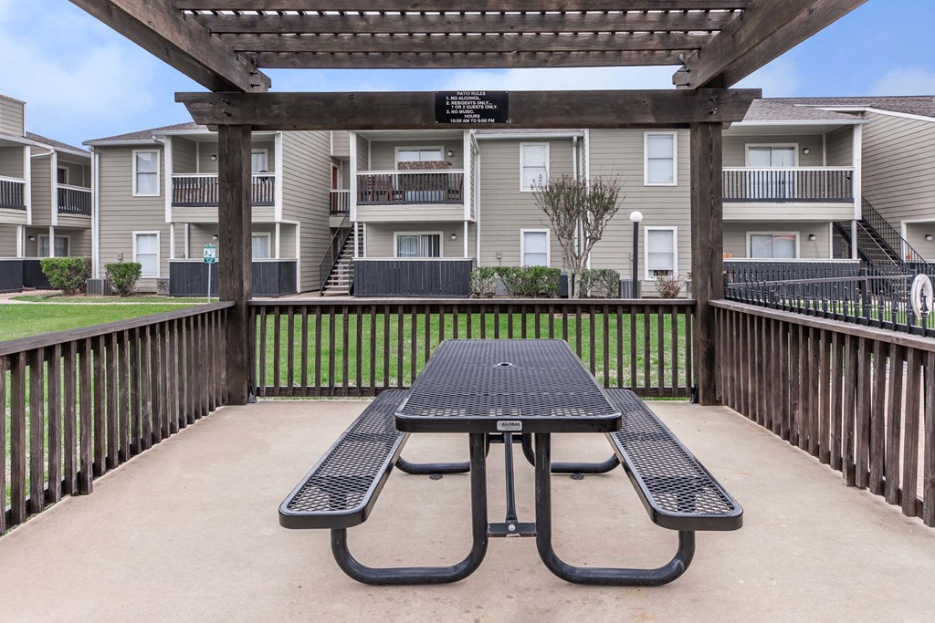 Outdoor area at Royal Wildewood Manor Apartments, Clute, TX