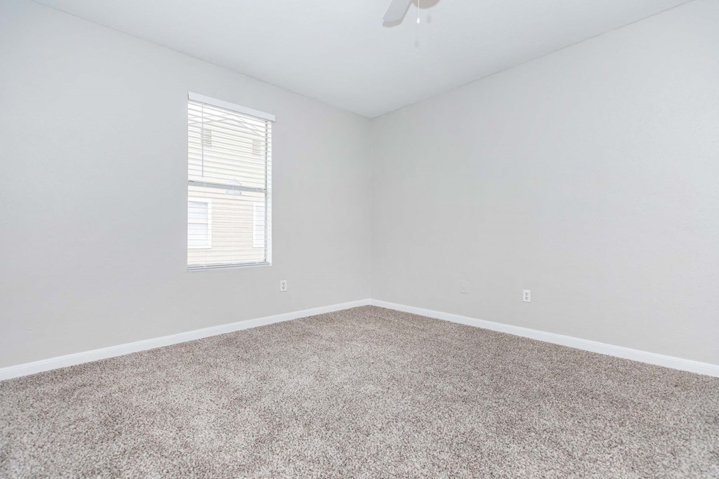 Unfurnished room with wooden tiles at Royal Wildewood Manor Apartments, Texas, 77531