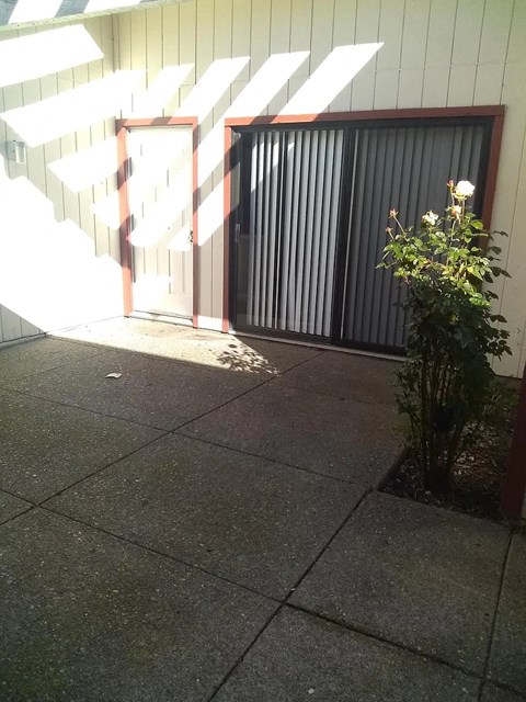the garage door is open to the outside of a building