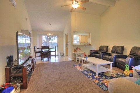 a living room with a couch and a table