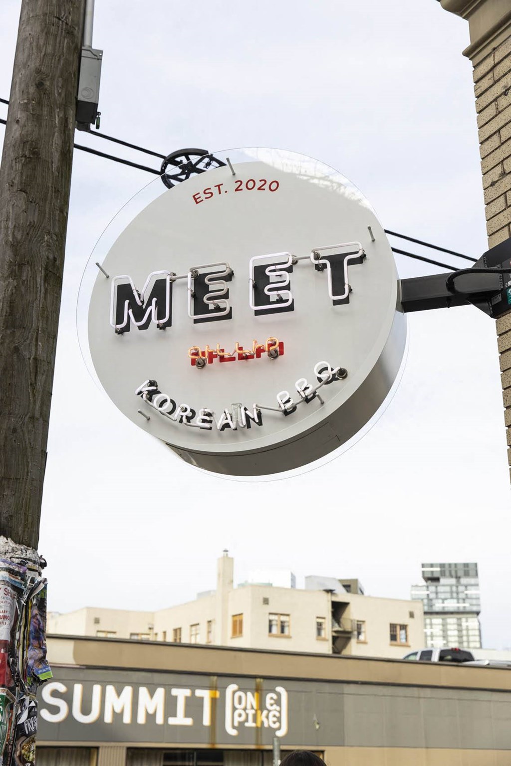 a sign for a restaurant on the side of a building