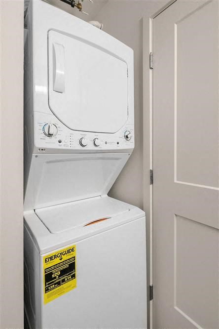 a white washer and dryer in a closet