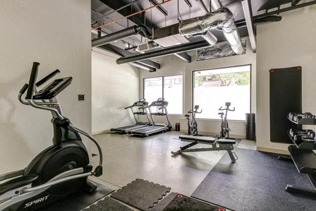 a gym with weights and other exercise equipment