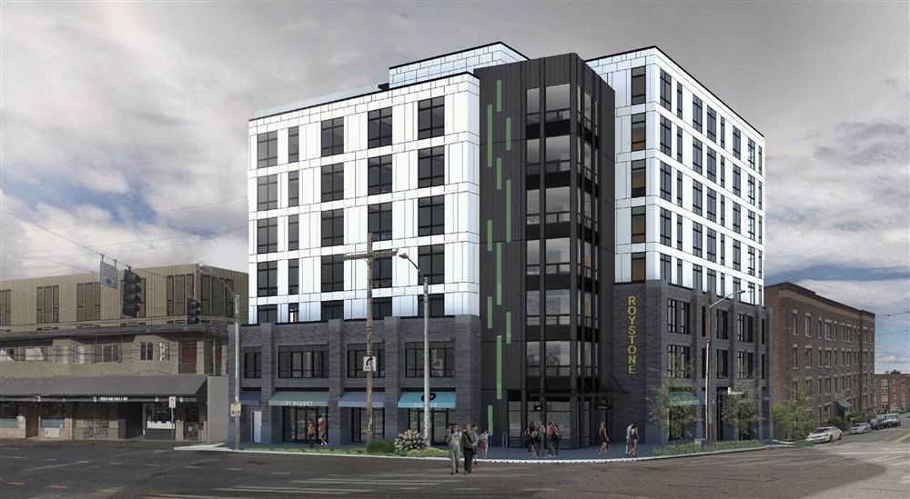 a tall building with a street in front of it