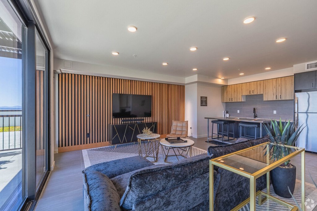 a living room with a couch and a table