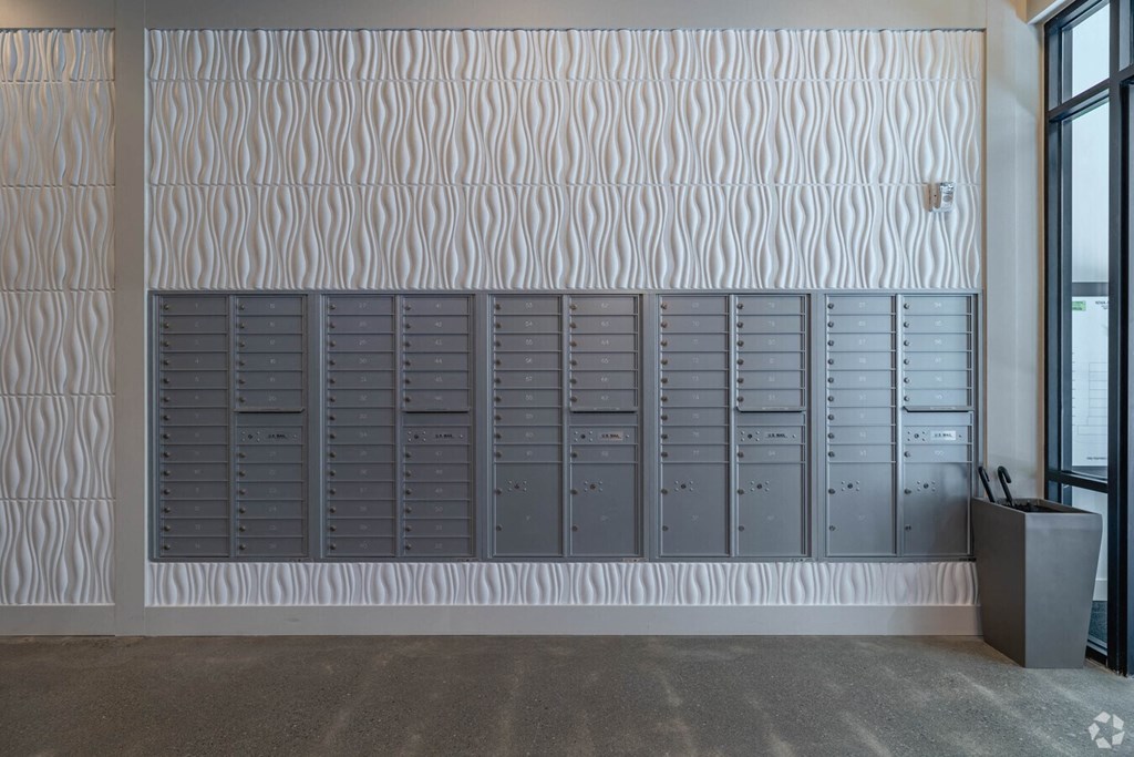 the lockers in the building are painted with a pattern on the wall