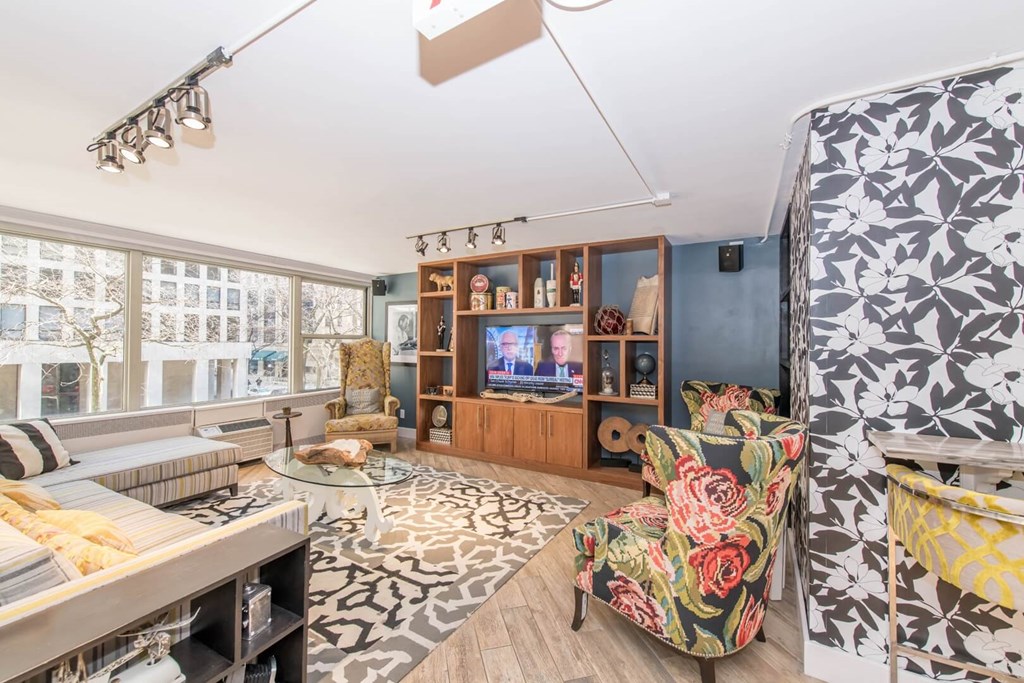 a living room with a couch and a tv