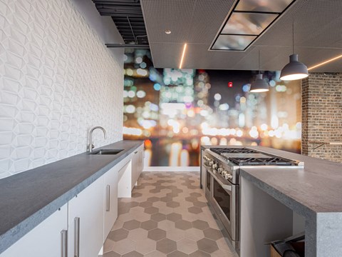 a kitchen with stainless steel appliances and counter tops