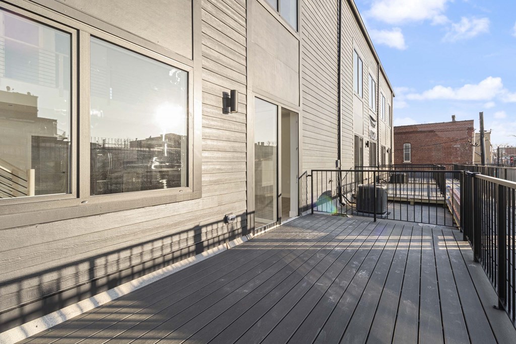 the deck of the building has a view of the city