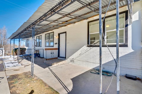 A house with a covered patio area.