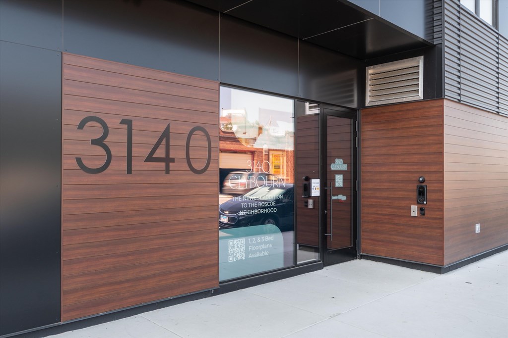 The number 3140 is displayed on a modern building.