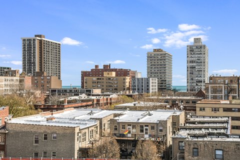 A cityscape with a mix of old and new buildings.