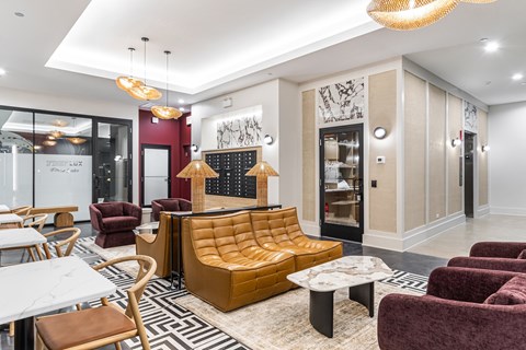A modern living room with a large sofa and a coffee table.