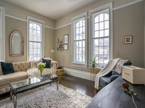 a living room with a couch and a table