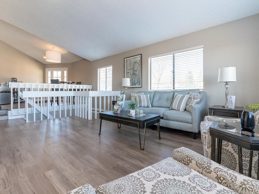 a living room with a couch and a table
