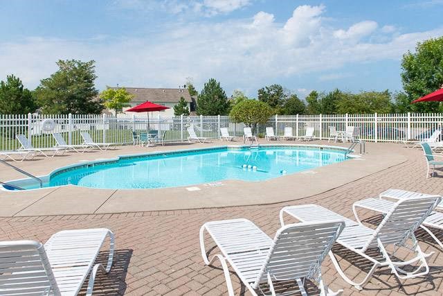 Pool and Pool Deck with Lounge Chairs & Tables