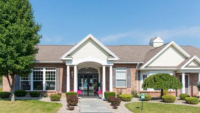 Exterior view of Webster Woods Leasing Office, Club Room, & Fitness Center entrance