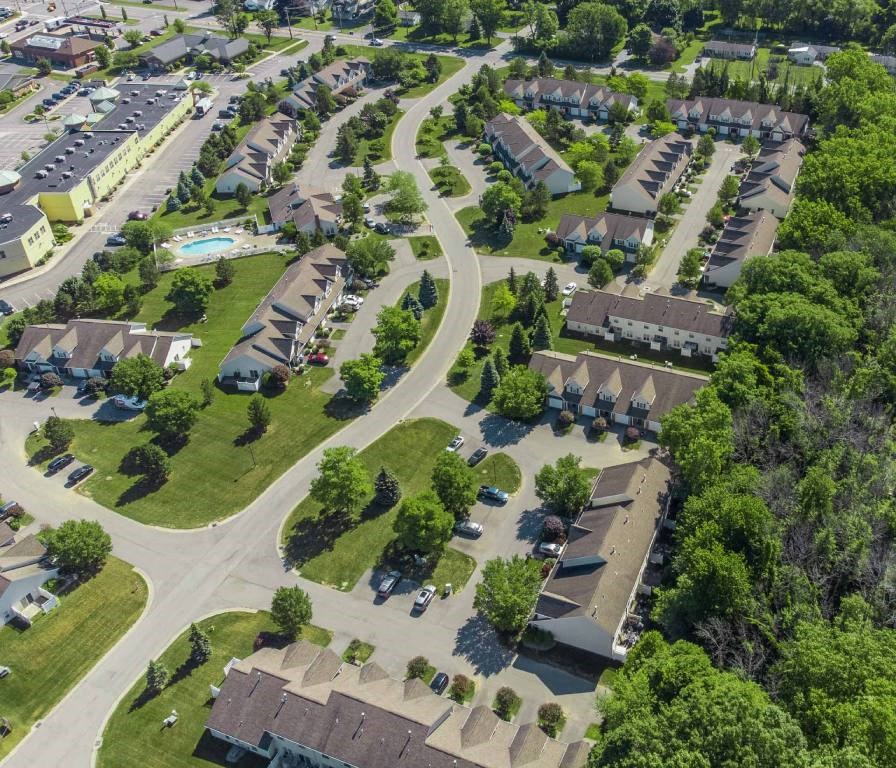 Exterior aerial view of Webster Woods townhomes neighborhood looking northeast