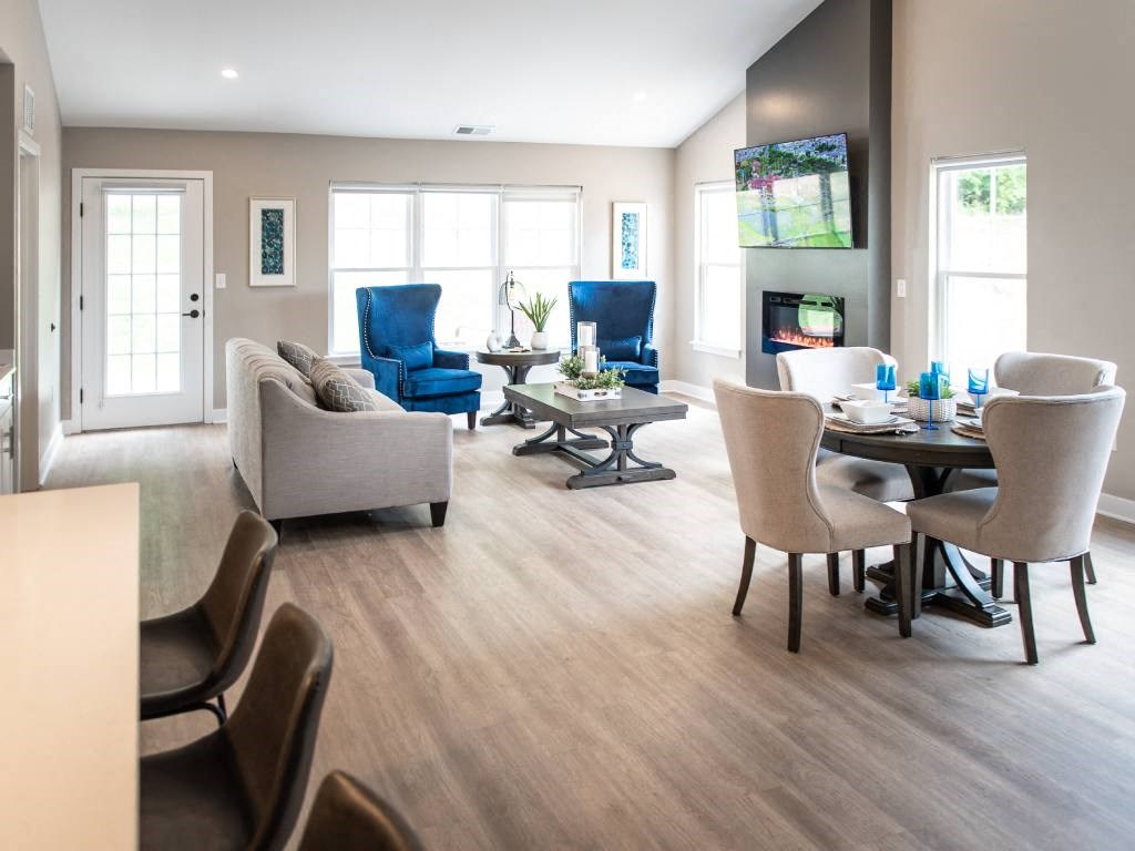 Interior of Champion Reserve Townhomes 2-bedroom end unit Great Room view of living, dining & part of kitchen area