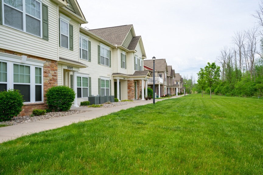 Exterior of Lehigh Park showing green areas near apartment buildings