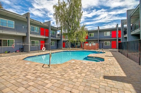 our apartments have a swimming pool and a courtyard with red units