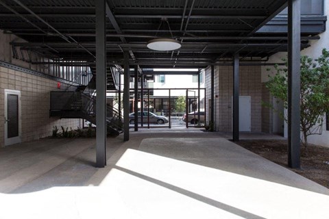 an empty building with a lobby and a staircase