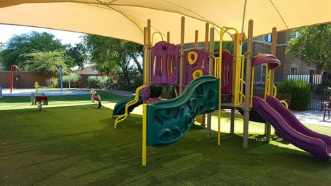 a childrens playground under a tent